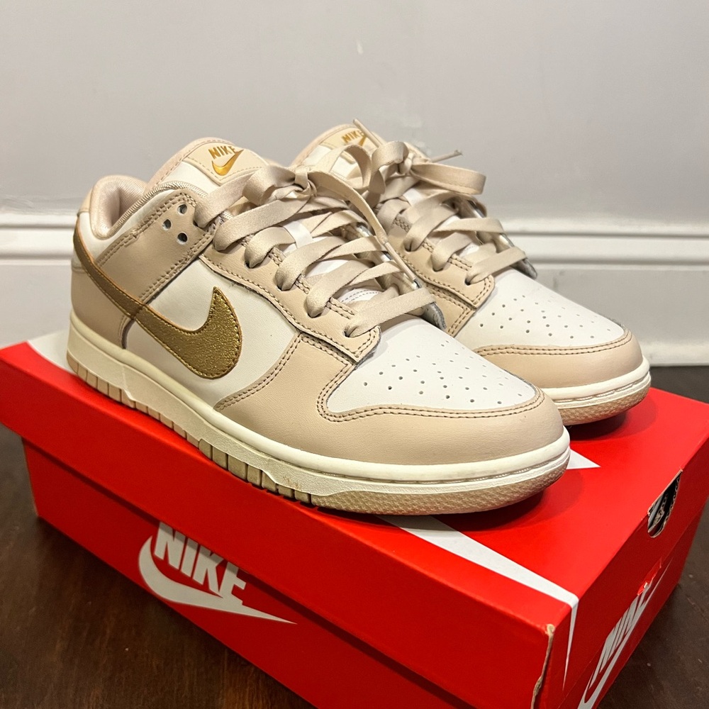 Nike Women’s Dunk Low “Gold Swoosh”